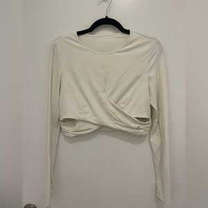 Titika active couture long sleeved workout crop top. Size M.